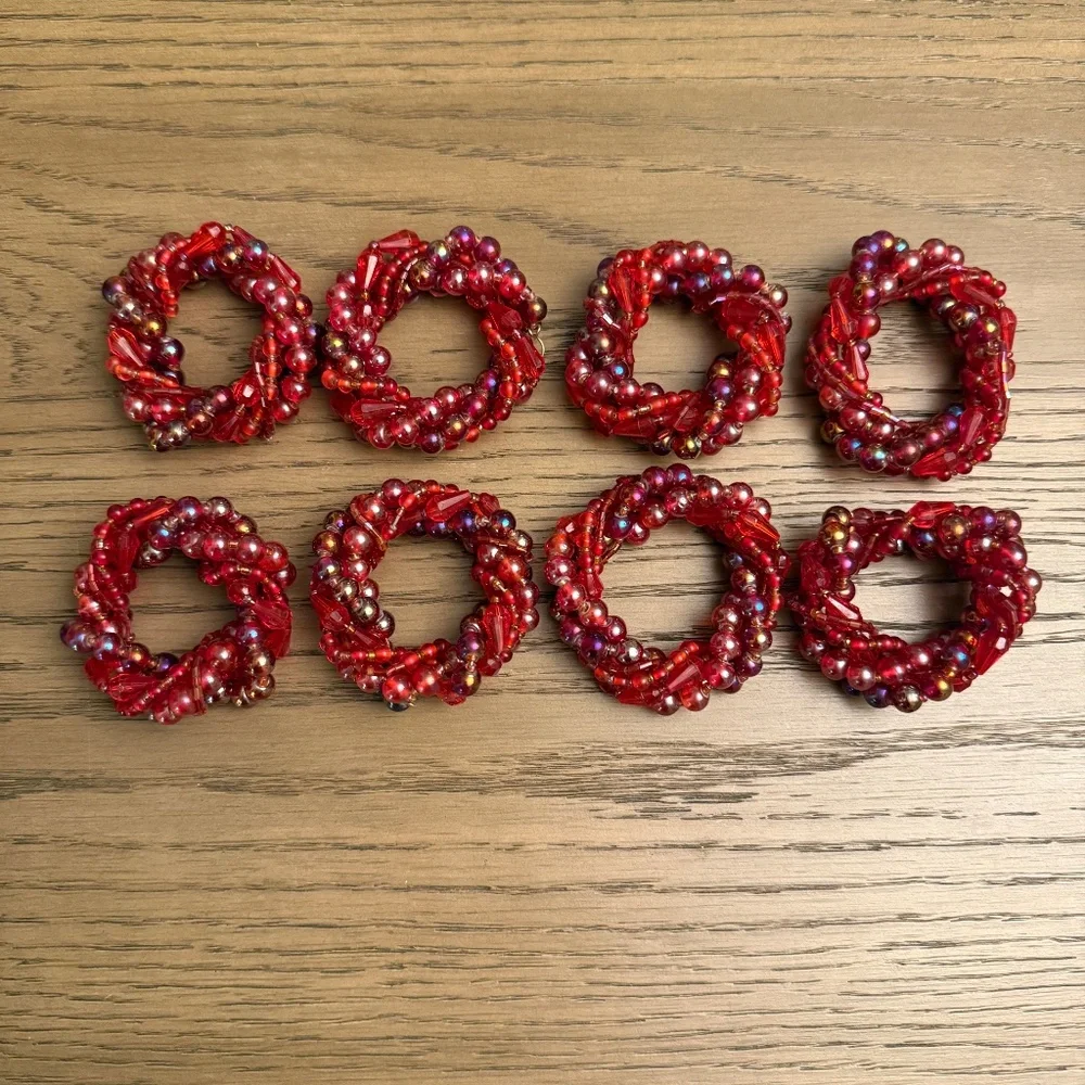 EUC - Eight Crate and Barrel napkin rings (napkin not included)